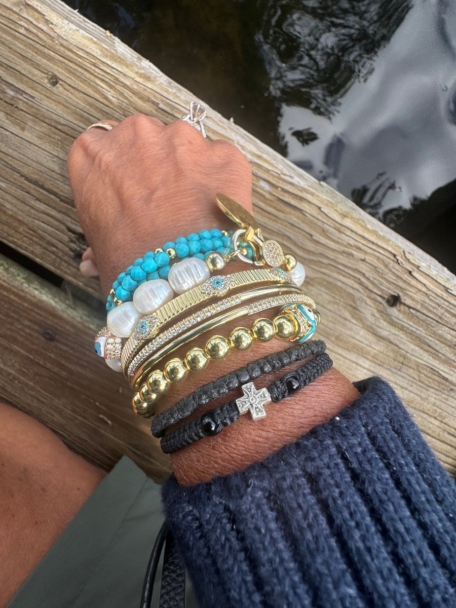 The Aegean Pearl Eleni With a Coin