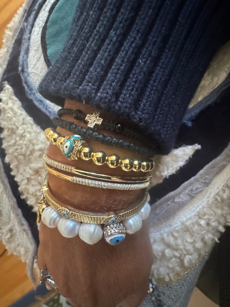 The Aegean Pearl Eleni With a Coin