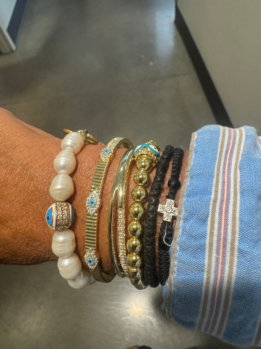 The Aegean Pearl Eleni With a Coin