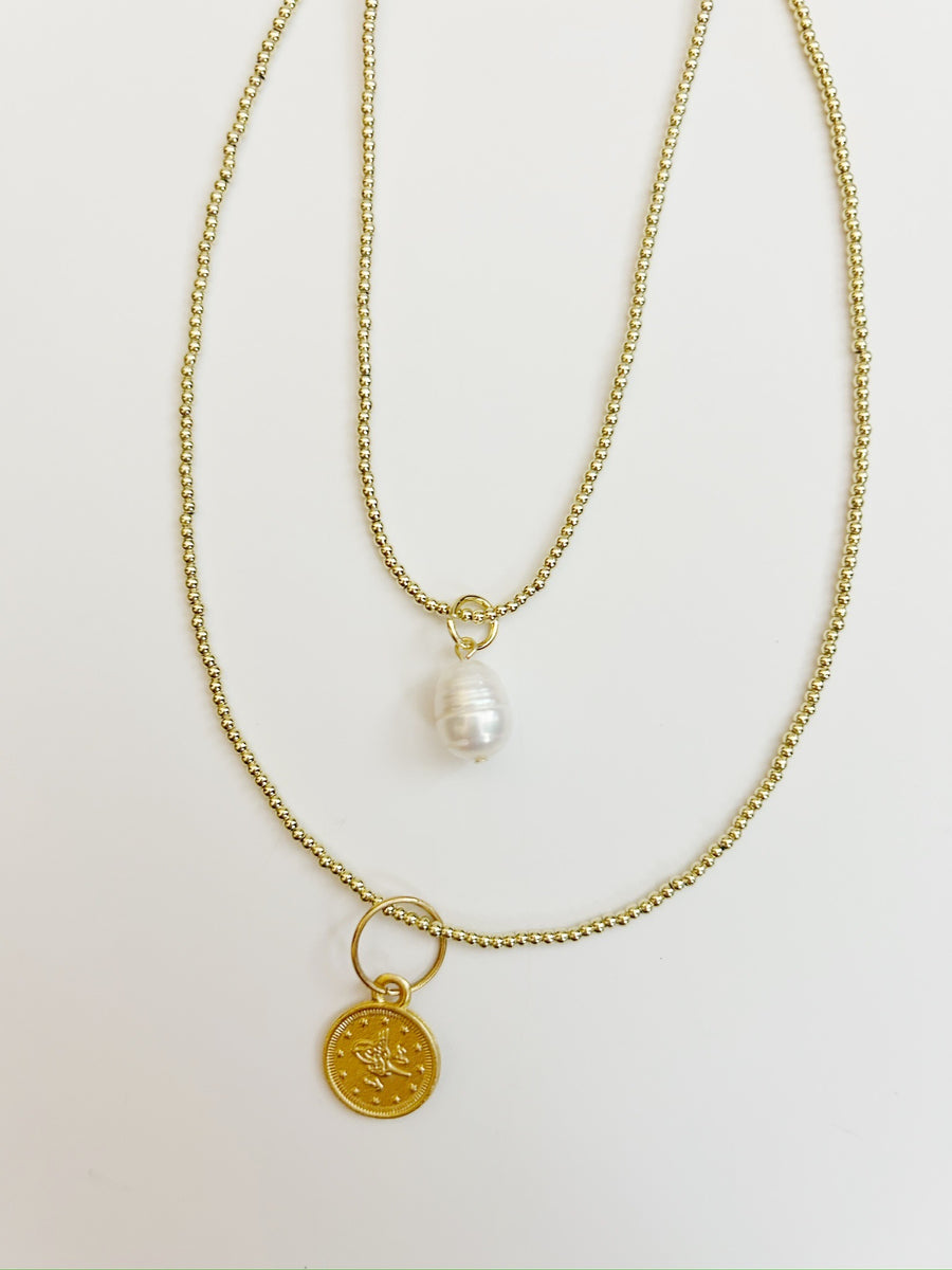 Gilded Baby Ball Necklace with Charm